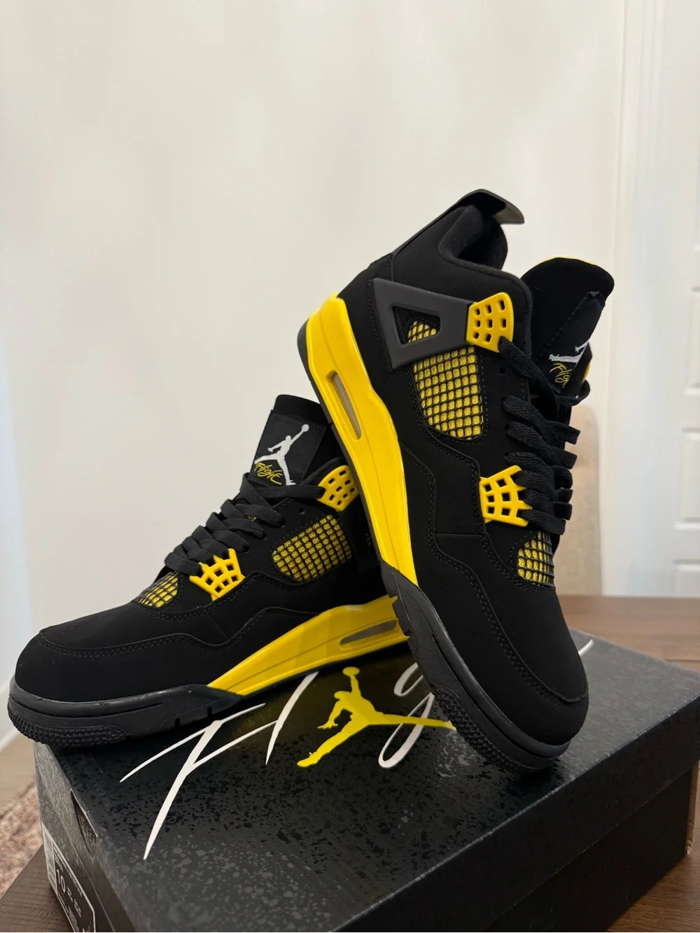 Nike Black and Yellow Retro High-Top Sneakers